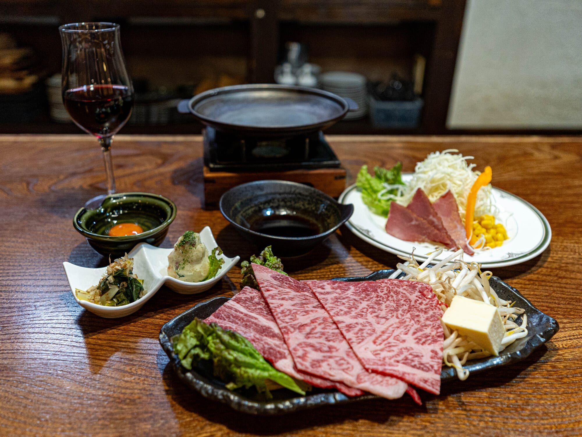 Yakisuki set of Yamagata beef with local wine