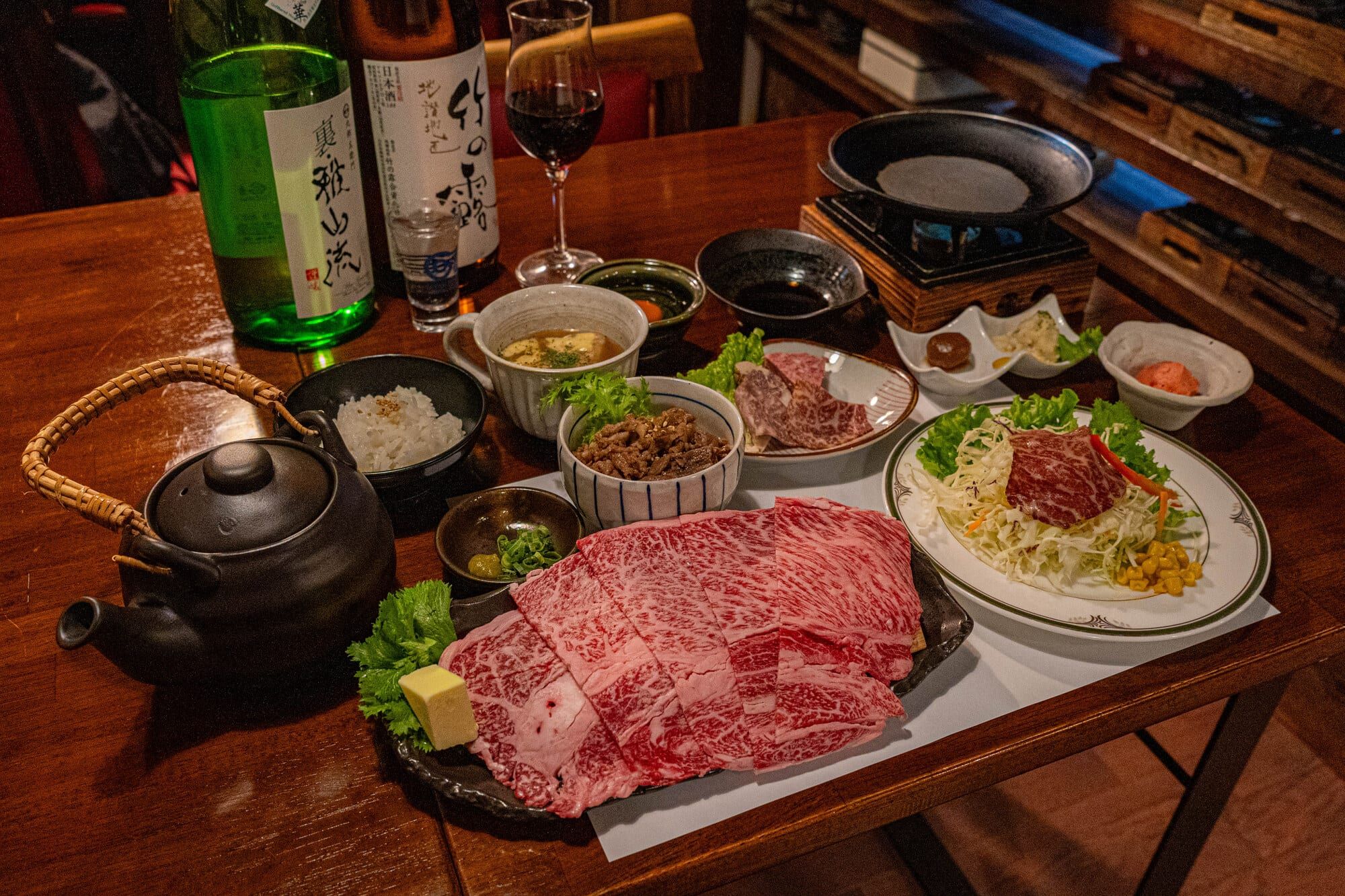 A generous serving of Yamagata beef with sake and sides